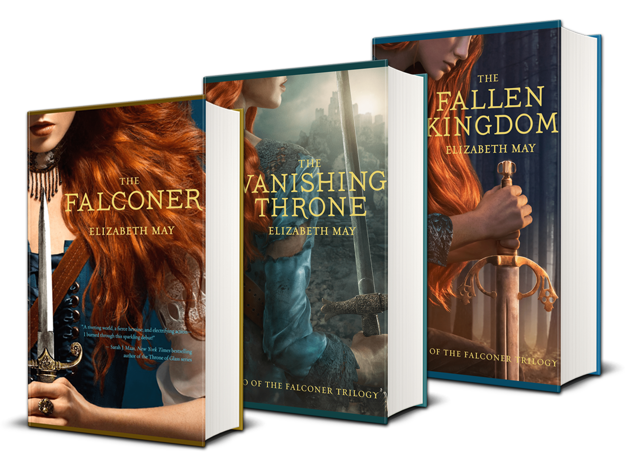 three books standing upright beside each other, each featuring a red headed woman with a weapon (book 1 with a dagger, book two with a sword, and book three with a sword). titles showing The Falconer by elizabeth may, the vanishing throne by elizabeth may, and the fallen kingdom by elizabeth may. red headed woman has her face half showing on each book.
